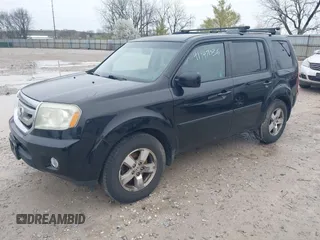 2011 Honda Pilot EX-L with VIN 5FNYF4H6XBB004269, listed as a IAAI auction lot 41947036 with 184,390 mi miles and . Bid and sale history available at carsss.com. Image 2.