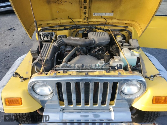 2000 Jeep Wrangler SE with VIN 1J4FA29PXYP775373, listed as a Copart auction lot 84903874 with 74,620 mi miles and Clean Title. Bid and sale history available at carsss.com. Image 12.