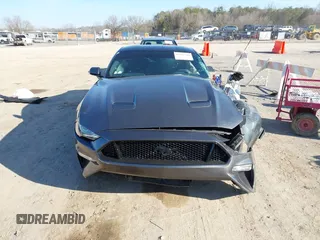 2018 Ford Mustang GT z VIN 1FA6P8CF4J5158775, wystawiony jako IAAI lot #41627780 z przebiegiem 65 519 mil mil oraz . Historia ofert i sprzedaży dostępna na DreamBid. Obrazek 12.