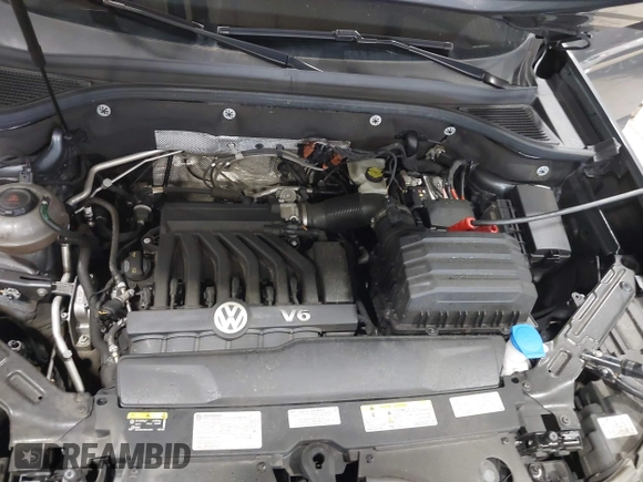 2021 Volkswagen Atlas SEL z VIN 1V2BE2CA6MC203777, wystawiony jako IAAI lot #42507511 z przebiegiem 76 358 mil mil oraz . Historia ofert i sprzedaży dostępna na DreamBid. Obrazek 10.