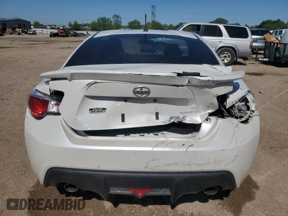 2014 Scion FR-S z VIN JF1ZNAA16E8702862, wystawiony jako Copart lot #57879575 z przebiegiem 101 775 mil mil oraz Szkoda całkowita • Salvage title. Historia ofert i sprzedaży dostępna na DreamBid. Obrazek 6.
