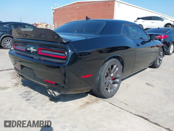 2021 Dodge Challenger R/T Scat Pack z VIN 2C3CDZFJXMH509833, wystawiony jako IAAI lot #41516858 z przebiegiem 66 880 mil mil oraz . Historia ofert i sprzedaży dostępna na DreamBid. Obrazek 4.