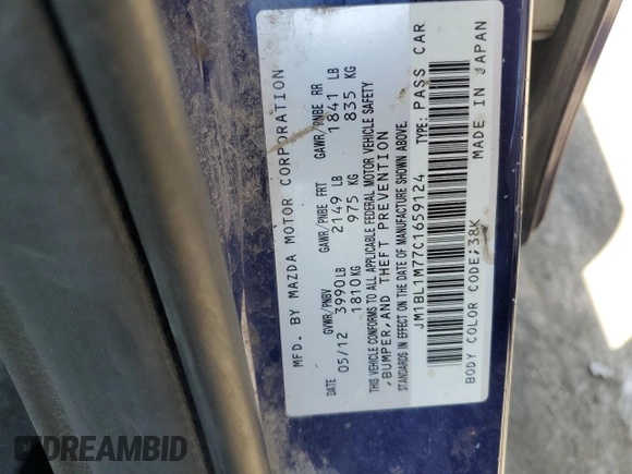 2012 Mazda 3 i Grand Touring z VIN JM1BL1M77C1659124, wystawiony jako Copart lot #56943355 z przebiegiem 105 465 mil mil oraz Szkoda całkowita • Salvage title. Historia ofert i sprzedaży dostępna na DreamBid. Obrazek 12.