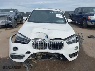 2018 BMW X1 xDrive28i with VIN WBXHT3C35J5K24695, listed as a IAAI auction lot 40932205 with 66,354 mi miles. Bid and sale history available at carsss.com. Image 11.
