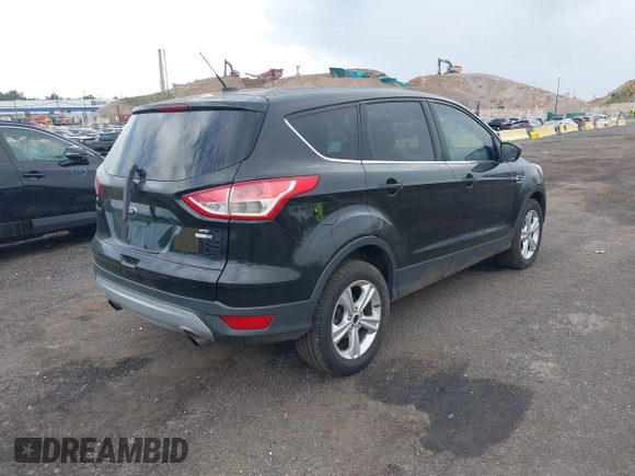 2013 Ford Escape SE with VIN 1FMCU9G99DUD71887, listed as a IAAI auction lot 42689284 with 70,662 mi miles and . Bid and sale history available at DreamBid. Image 4.