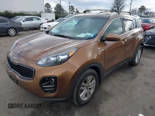 2018 Kia Sportage LX with VIN KNDPMCAC5J7419709, listed as a IAAI auction lot 41230791 with 85,491 mi miles. Bid and sale history available at carsss.com. Image 2.