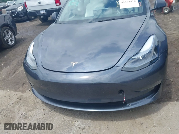 2023 Tesla Model 3 with VIN 5YJ3E1EAXPF628911, listed as a IAAI auction lot 42362410 with 25,387 mi miles and . Bid and sale history available at DreamBid. Image 13.