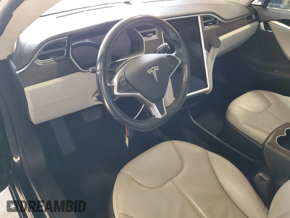 2014 Tesla Model S 60 with VIN 5YJSA1H16EFP43523, listed as a Copart auction lot 63291145 with Not provided miles and Clean title. Bid and sale history available at DreamBid. Image 8.