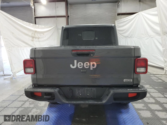 2023 Jeep Gladiator Overland z VIN 1C6HJTFGXPL560873, wystawiony jako Copart lot #47033235 z przebiegiem Nie podano mil oraz Czysty tytuł • Clean title. Historia ofert i sprzedaży dostępna na DreamBid. Obrazek 6.