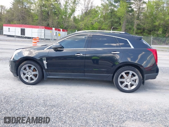2012 Cadillac SRX Performance Collection with VIN 3GYFNEE32CS512118, listed as a IAAI auction lot 42158452 with 143,449 mi miles. Bid and sale history available at carsss.com. Image 14.