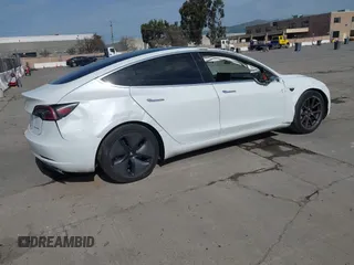 2018 Tesla Model 3 Long Range Battery with VIN 5YJ3E1EB7JF108519, listed as a IAAI auction lot 41835266 with 120,662 mi miles and . Bid and sale history available at DreamBid. Image 4.
