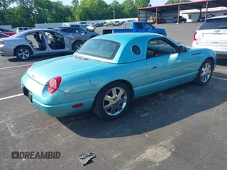 2002 Ford Thunderbird Hardtop Premium z VIN 1FAHP60AX2Y118061, wystawiony jako IAAI lot #42332263 z przebiegiem 162 591 mil mil oraz . Historia ofert i sprzedaży dostępna na DreamBid. Obrazek 4.