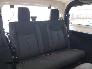 2014 Jeep Wrangler Arctic z VIN 1C4GJWBG3EL313350, wystawiony jako IAAI lot #41442520 z przebiegiem Nie podano mil oraz . Historia ofert i sprzedaży dostępna na DreamBid. Obrazek 8.