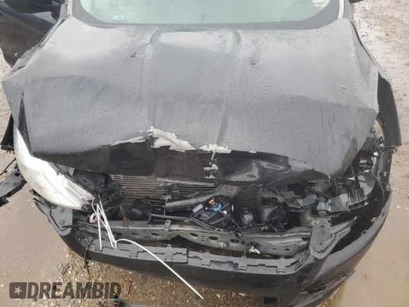 2015 Ford Escape SE with VIN 1FMCU9GX7FUC44640, listed as a Copart auction lot 77141033 with 148,967 mi miles and Salvage Title. Bid and sale history available at DreamBid. Image 12.
