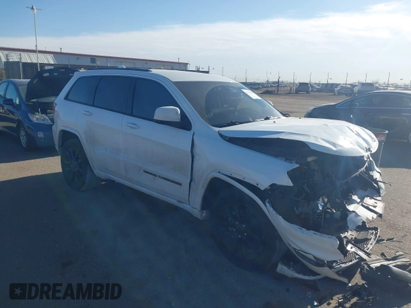 2017 Jeep Grand Cherokee Laredo with VIN 1C4RJFAG2HC876727, listed as a IAAI auction lot 41712954 with 134,412 mi miles. Bid and sale history available at carsss.com. Image 1.