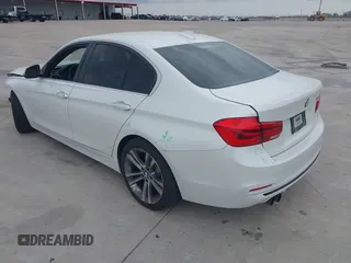 2017 BMW 3 Series 330i with VIN WBA8B9G51HNU09431, listed as a IAAI auction lot 41869627 with 87,719 mi miles. Bid and sale history available at carsss.com. Image 3.