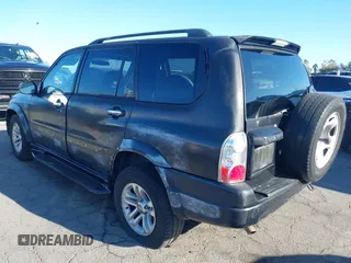 2004 Suzuki XL7 LX z VIN JS3TX92V144106723, wystawiony jako IAAI lot #40407888 z przebiegiem 284 088 mil mil oraz . Historia ofert i sprzedaży dostępna na DreamBid. Obrazek 3.