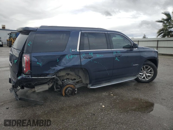 2017 GMC Yukon SLT with VIN 1GKS1BKC5HR295827, listed as a Copart auction lot 48189565 with 106,867 mi miles and Salvage Title. Bid and sale history available at carsss.com. Image 3.