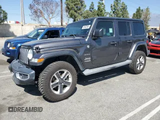 2018 Jeep Wrangler Unlimited Sahara z VIN 1C4HJXEN6JW248376, wystawiony jako Copart lot #52692565 z przebiegiem 138 472 mil mil oraz Szkoda całkowita • Salvage title. Historia ofert i sprzedaży dostępna na DreamBid. Obrazek 1.