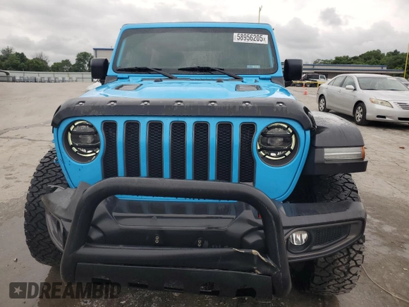 2021 Jeep Wrangler Unlimited Rubicon with VIN 1C4JJXFM4MW617635, listed as a Copart auction lot 58956205 with 52,995 mi miles and Salvage title. Bid and sale history available at DreamBid. Image 5.