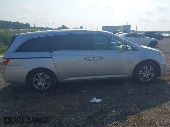 2012 Honda Odyssey EX-L with VIN 5FNRL5H65CB039015, listed as a IAAI auction lot 42612886 with 216,955 mi miles and . Bid and sale history available at DreamBid. Image 13.