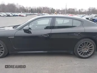 2016 Porsche Panamera 4 z VIN WP0AA2A72GL005752, wystawiony jako IAAI lot #41869840 z przebiegiem 114 719 mil mil oraz . Historia ofert i sprzedaży dostępna na DreamBid. Obrazek 14.