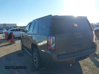 2015 GMC Yukon SLE with VIN 1GKS1AKCXFR712897, listed as a IAAI auction lot 41357889 with 1 mi miles. Bid and sale history available at carsss.com. Image 3.