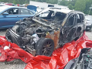 2020 BMW X5 sDrive40i with VIN 5UXCR4C08L9C07579, listed as a IAAI auction lot 41871208 with Not Provided miles and . Bid and sale history available at DreamBid. Image 2.