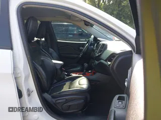 2021 Jeep Cherokee Trailhawk with VIN 1C4PJMBX4MD124980, listed as a IAAI auction lot 42372537 with 55,667 mi miles and . Bid and sale history available at DreamBid. Image 5.