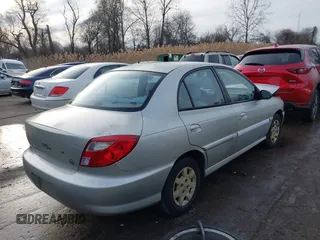 2001 Kia Rio with VIN KNADC123716042067, listed as a IAAI auction lot 41449479 with 113,108 mi miles. Bid and sale history available at carsss.com. Image 4.