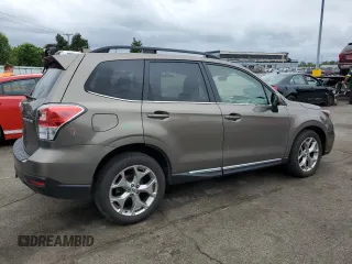2018 Subaru Forester Touring with VIN JF2SJAWC9JH570189, listed as a Copart auction lot 57940935 with 76,574 mi miles and Salvage title. Bid and sale history available at DreamBid. Image 3.