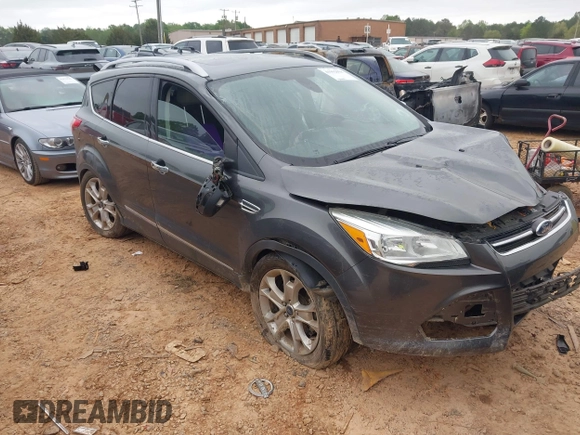 2015 Ford Escape Titanium with VIN 1FMCU9J90FUC14650, listed as a IAAI auction lot 41992858 with 158,963 mi miles and . Bid and sale history available at DreamBid. Image 1.