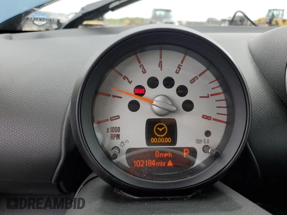 2012 MINI Countryman S with VIN WMWZC3C57CWL86423, listed as a Copart auction lot 57584195 with 102,184 mi miles and Salvage title. Bid and sale history available at DreamBid. Image 9.
