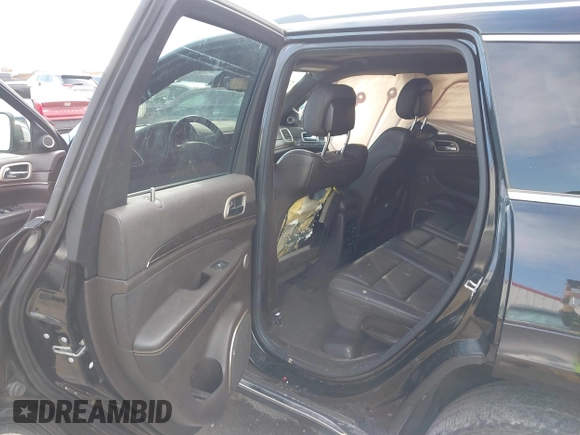 2014 Jeep Grand Cherokee Summit с VIN 1C4RJEJG4EC490624, выставлен на аукционе IAAI как лот 41341713 с пробегом 74 100 миль миль и . История ставок и продаж доступна на DreamBid. Изображение 8.