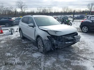 2019 Volkswagen Tiguan SE with VIN 3VV3B7AX7KM040136, listed as a IAAI auction lot 41397714 with 82,302 mi miles and . Bid and sale history available at DreamBid. Image 1.