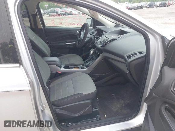 2015 Ford Escape SE z VIN 1FMCU0G73FUB10414, wystawiony jako IAAI lot #42173063 z przebiegiem 120 200 mil mil oraz . Historia ofert i sprzedaży dostępna na DreamBid. Obrazek 5.