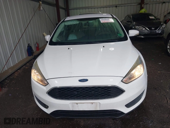 2016 Ford Focus SE с VIN 1FADP3F22GL211156, выставлен на аукционе IAAI как лот 42502613 с пробегом 121 224 миль миль и . История ставок и продаж доступна на DreamBid. Изображение 12.