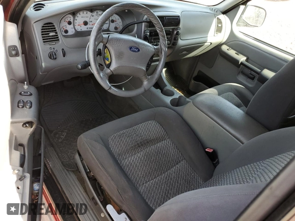 2003 Ford Explorer Sport XLS z VIN 1FMZU70E83UB73094, wystawiony jako Copart lot #45476425 z przebiegiem 233 414 mil mil oraz Szkoda całkowita • Salvage title. Historia ofert i sprzedaży dostępna na DreamBid. Obrazek 8.