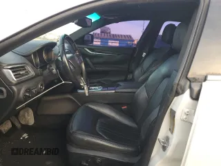 2014 Maserati Ghibli z VIN ZAM57XSA6E1097525, wystawiony jako Copart lot #42029695 z przebiegiem 93 740 mil mil oraz Szkoda całkowita • Salvage title. Historia ofert i sprzedaży dostępna na DreamBid. Obrazek 7.