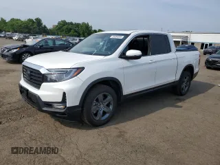 2023 Honda Ridgeline RTL with VIN 5FPYK3F53PB067003, listed as a Copart auction lot 58384895 with 31,983 mi miles and Salvage title. Bid and sale history available at DreamBid. Image 1.