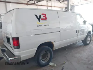 2011 Ford Econoline Cargo Commercial with VIN 1FTNE2EW6BDB06514, listed as a IAAI auction lot 42177011 with 336,946 mi miles. Bid and sale history available at carsss.com. Image 4.