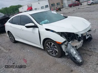 2018 Honda Civic LX with VIN 2HGFC2F59JH576975, listed as a IAAI auction lot 42098020 with 89,791 mi miles and . Bid and sale history available at DreamBid. Image 1.