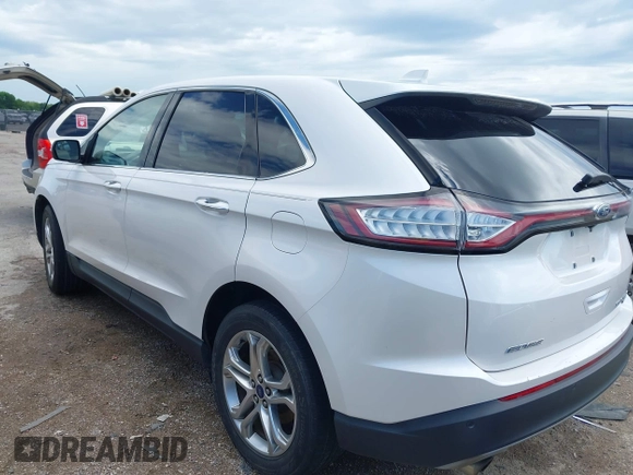 2017 Ford Edge Titanium z VIN 2FMPK3K98HBB28403, wystawiony jako IAAI lot #42103773 z przebiegiem 131 525 mil mil oraz . Historia ofert i sprzedaży dostępna na DreamBid. Obrazek 3.