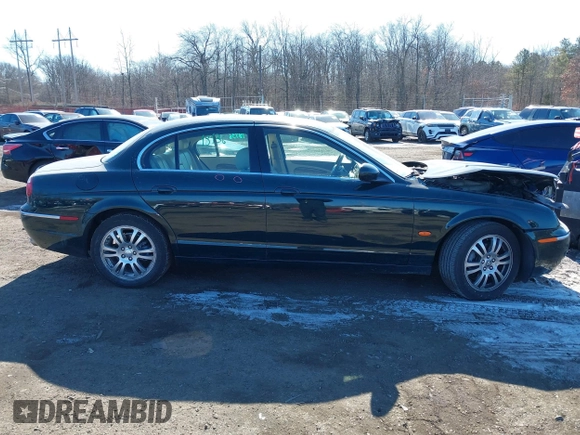 2005 Jaguar S-Type with VIN SAJWA01T95FN51551, listed as a IAAI auction lot 41637854 with 90,075 mi miles and . Bid and sale history available at DreamBid. Image 13.