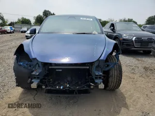 2024 Tesla Model Y Long Range z VIN 7SAYGDEE8RA248635, wystawiony jako Copart lot #59130125 z przebiegiem 21 210 mil mil oraz Szkoda całkowita • Salvage title. Historia ofert i sprzedaży dostępna na DreamBid. Obrazek 5.