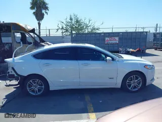 2016 Ford Fusion Energi Titanium with VIN 3FA6P0SU4GR320590, listed as a IAAI auction lot 41748132 with 360,161 mi miles. Bid and sale history available at carsss.com. Image 13.