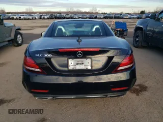 2020 Mercedes-Benz SLC 300 z VIN W1KPK3JA7LF171157, wystawiony jako Copart lot #83157894 z przebiegiem Nie podano mil oraz Szkody całkowita. Historia ofert i sprzedaży dostępna na DreamBid. Obrazek 6.