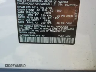 2023 Volkswagen Atlas SEL z VIN 1V2BR2CA6PC555170, wystawiony jako Copart lot #55445335 z przebiegiem 20 243 mil mil oraz Szkoda całkowita • Salvage title. Historia ofert i sprzedaży dostępna na DreamBid. Obrazek 13.
