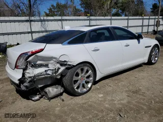 2016 Jaguar XJ with VIN SAJWA2G70G8W01136, listed as a Copart auction lot 50120455 with 92,224 mi miles and Salvage Title. Bid and sale history available at carsss.com. Image 3.