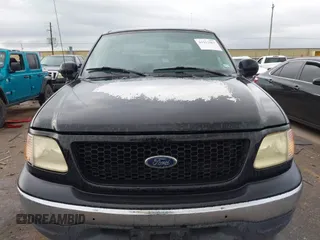 2003 Ford F-150 XLT with VIN 1FTRW07623KD67409, listed as a IAAI auction lot 41912067 with Not Provided miles. Bid and sale history available at carsss.com. Image 6.